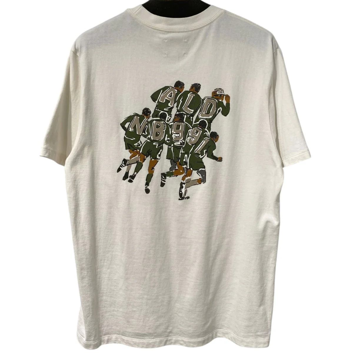 日本未発売991 Club Tee Papyrus Tシャツ